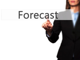 Forecast  - Businesswoman hand pressing button on touch screen interface.