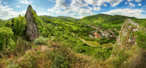 Spring panorama with village and mountain