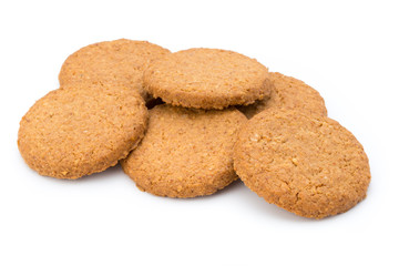 Stacked short pastry cookies isolated on white background.