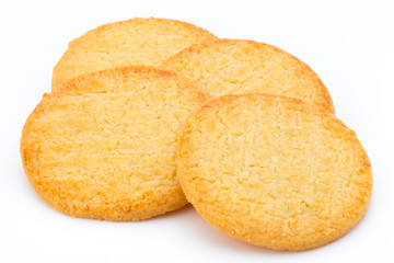 Stacked short pastry cookies isolated on white background.