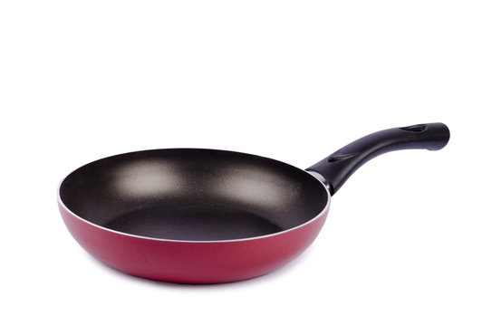 Red frying pan isolated on white