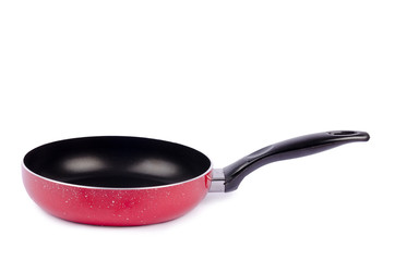 Red frying pan isolated on white