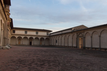 Fototapeta na wymiar Fore courtyard and entrance of Florence Charterhouse church. Certosa di Galluzzo di Firenze. Italy.