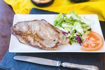 Grilled steak with salad