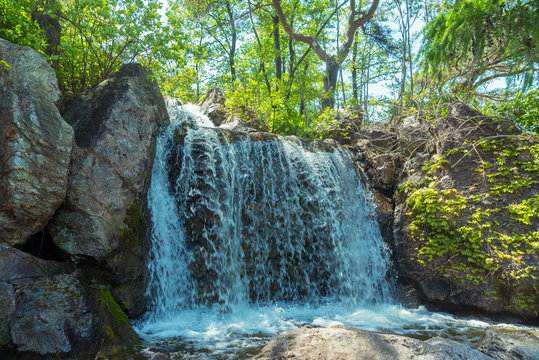 Waterfall on a rocks of a botanic garden in Chicago