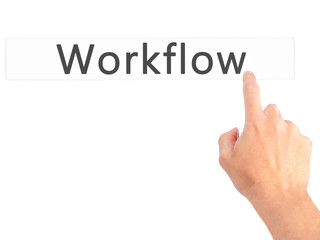Workflow - Hand pressing a button on blurred background concept on visual screen.