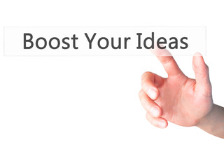 Boost Your Ideas - Hand pressing a button on blurred background concept on visual screen.