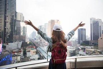 Young asian lady travel in city center