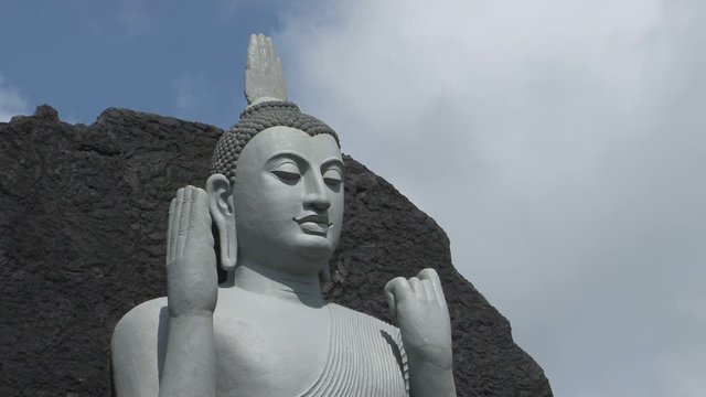 Standing white buddha