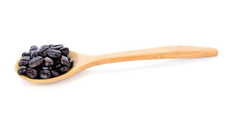 coffee beans with wooden spoon isolated on white