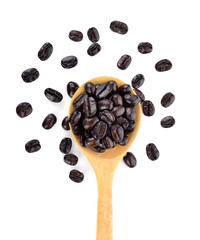 coffee beans with wooden spoon isolated on white