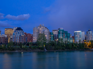 Fototapeta premium Condo towers in urban Calgary along the Bow River