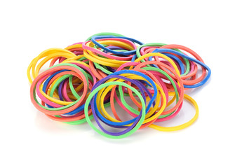 Colorful rubber bands on white background