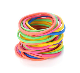 Colorful rubber bands on white background