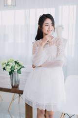 portrait of beautiful asian girl with beautiful bride dress.