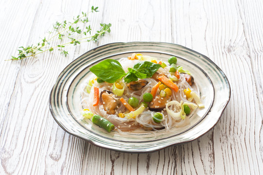 Rice noodles with vegetables and seafood