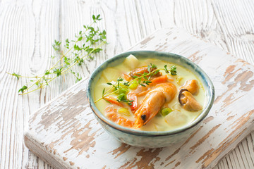 Soup with vegetables and seafood