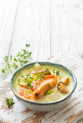 Soup with vegetables and seafood