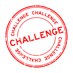 Grunge red challenge round rubber seal stamp on white background
