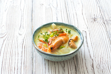 Soup with vegetables and seafood