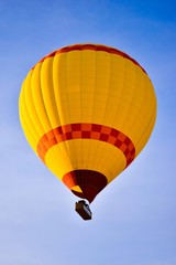 Fototapeta premium Hot air balloon flying over spectacular Cappadocia