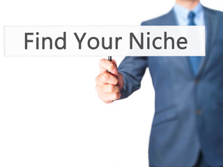 Find Your Niche - Businessman hand holding sign