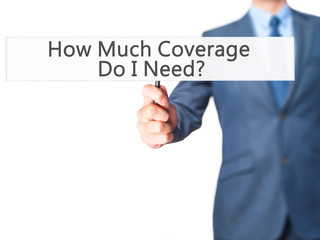 How Much Coverage Do I Need - Businessman hand holding sign