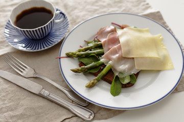 Sandwich with ham, cheese, and asparagus