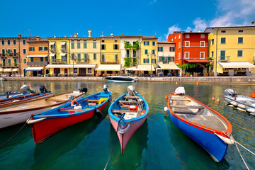 Lazise colorful harbor and boats view