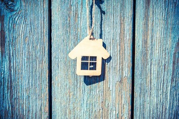 The symbol hanging on blue wooden background