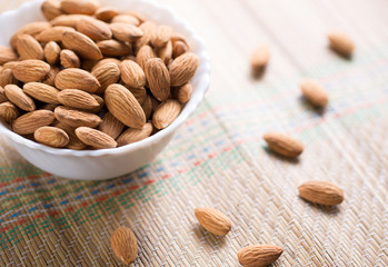 Close-up of almonds on white bowl