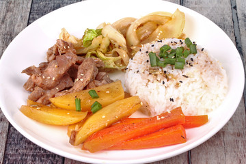 Thai jasmine rice in American korean style, Rice with sliced pork steak.