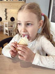 Pretty  little girl with ice-cream