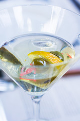 Glass of martini with olives