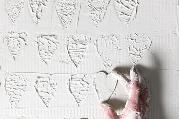 Hand Heart Stamp White Plaster Background Decorative Stucco Pattern Handmade Love Concept