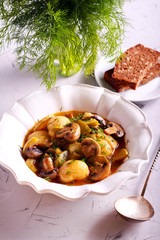 Potato, mushroom and zucchini casserole