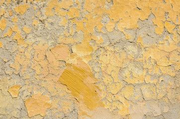 Old yellow cracked plaster