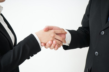 Business persons shaking hands