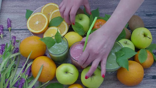 Fruit and milk cocktail among fruits. Smoothies. Detox