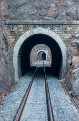 Fototapeta na wymiar Old brick tunnel in the mountains