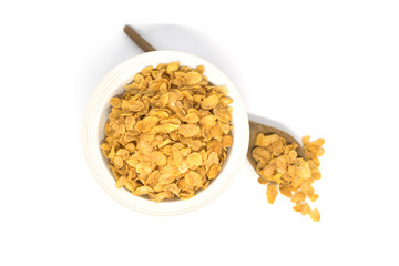 Corn flakes and bowl isolated focus selective corn flakes on bowl