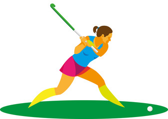 Young woman is hockey players on the grass strikes the ball