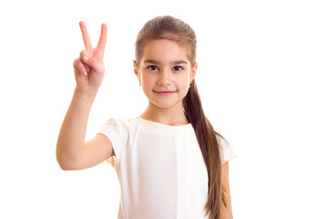 Little girl in white T-shirt and black skirt