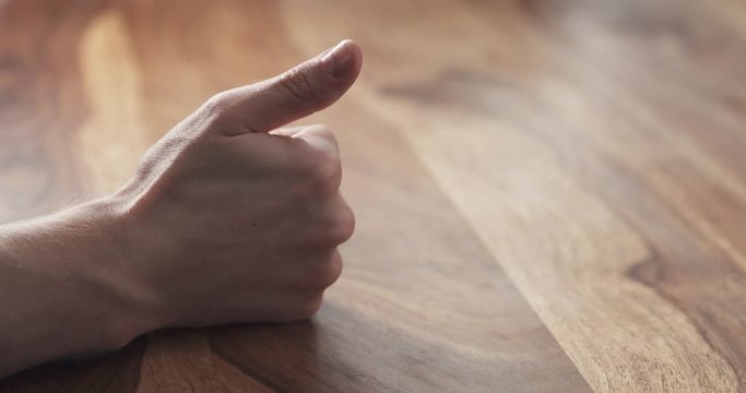 Young man hand finger count at the table, 4k 60fps prores footage