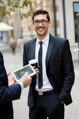 Portrait of handsome businessman outdoor