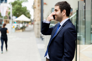 Portrait of handsome businessman outdoor