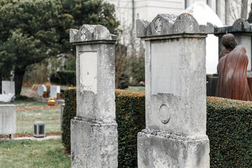 Old Vienna Austrian cemetery architecture with statues and marble tombstones for the graves