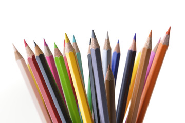 Fototapeta premium Front view of colored Pencils on White Background