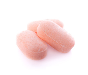 Herbal drugs capsules isolated on white..