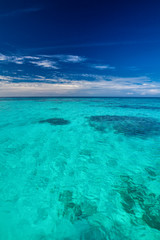 Tropical ocean with blue sky with vibrant ocean colors